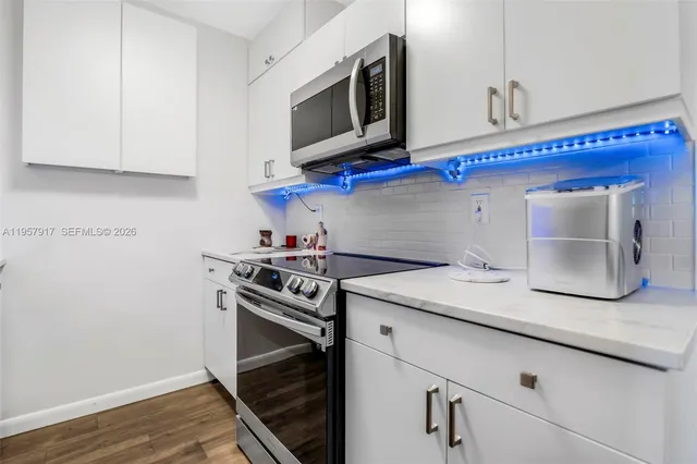 a view of cabinets and window