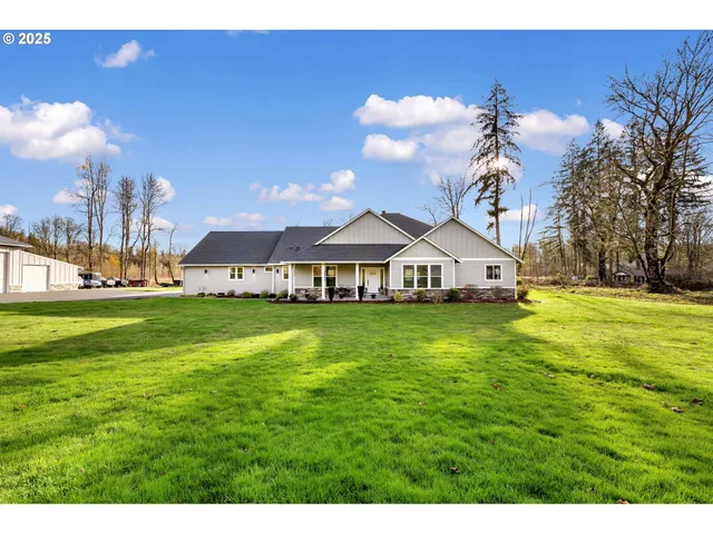 a view of a house with a big yard