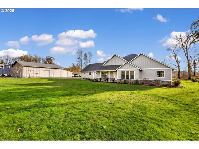 a view of a house with a big yard
