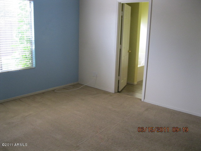 8933 West Merrell Street Phoenix, AZ 85037 - Photo 5 of 10 Master Bedroom