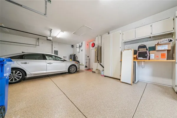 a view of parking garage with cars