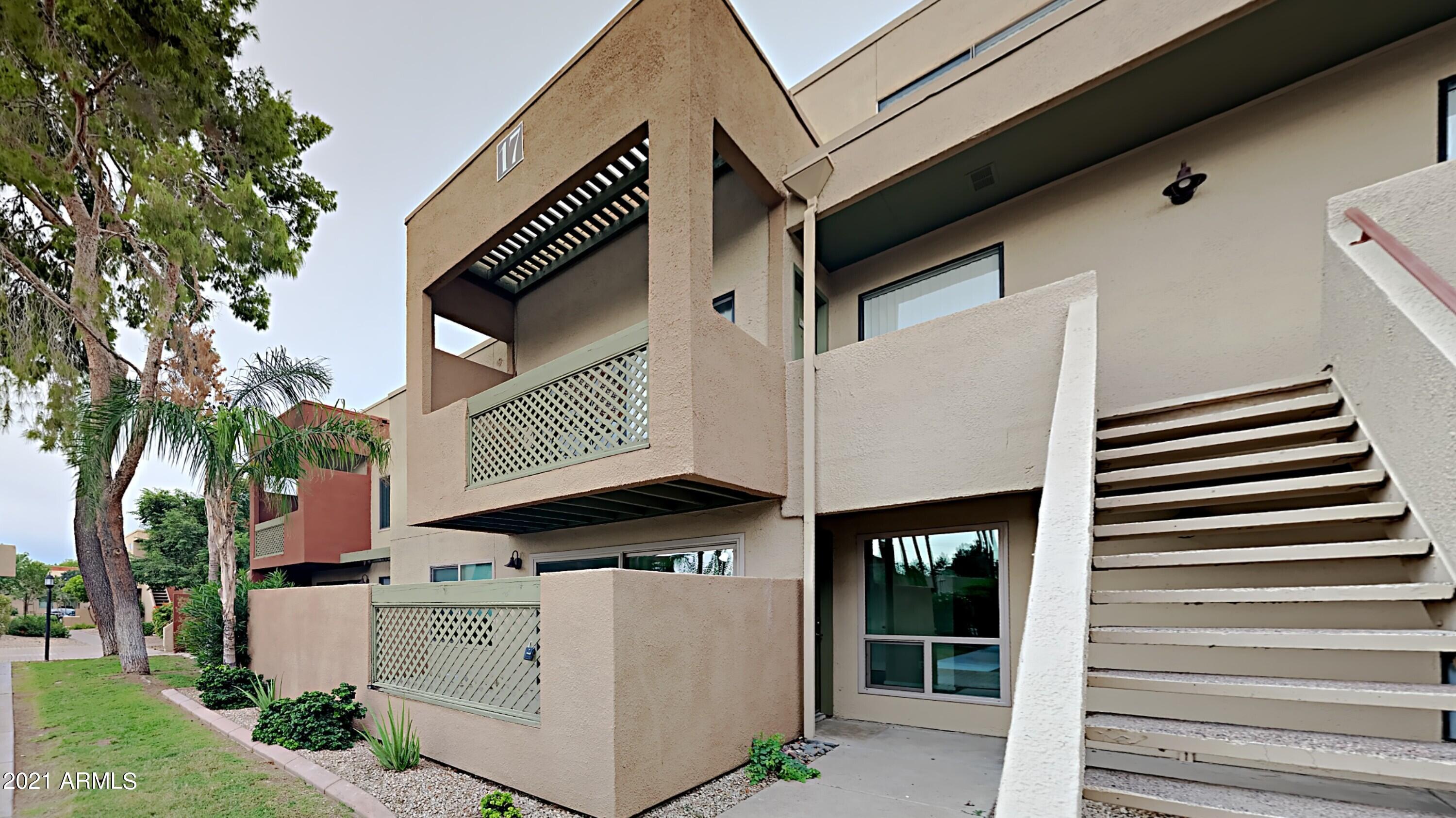3500 North Hayden Road, Unit 1703 Scottsdale, AZ 85251 - Photo 1 of 8 a view of a street with potted plants