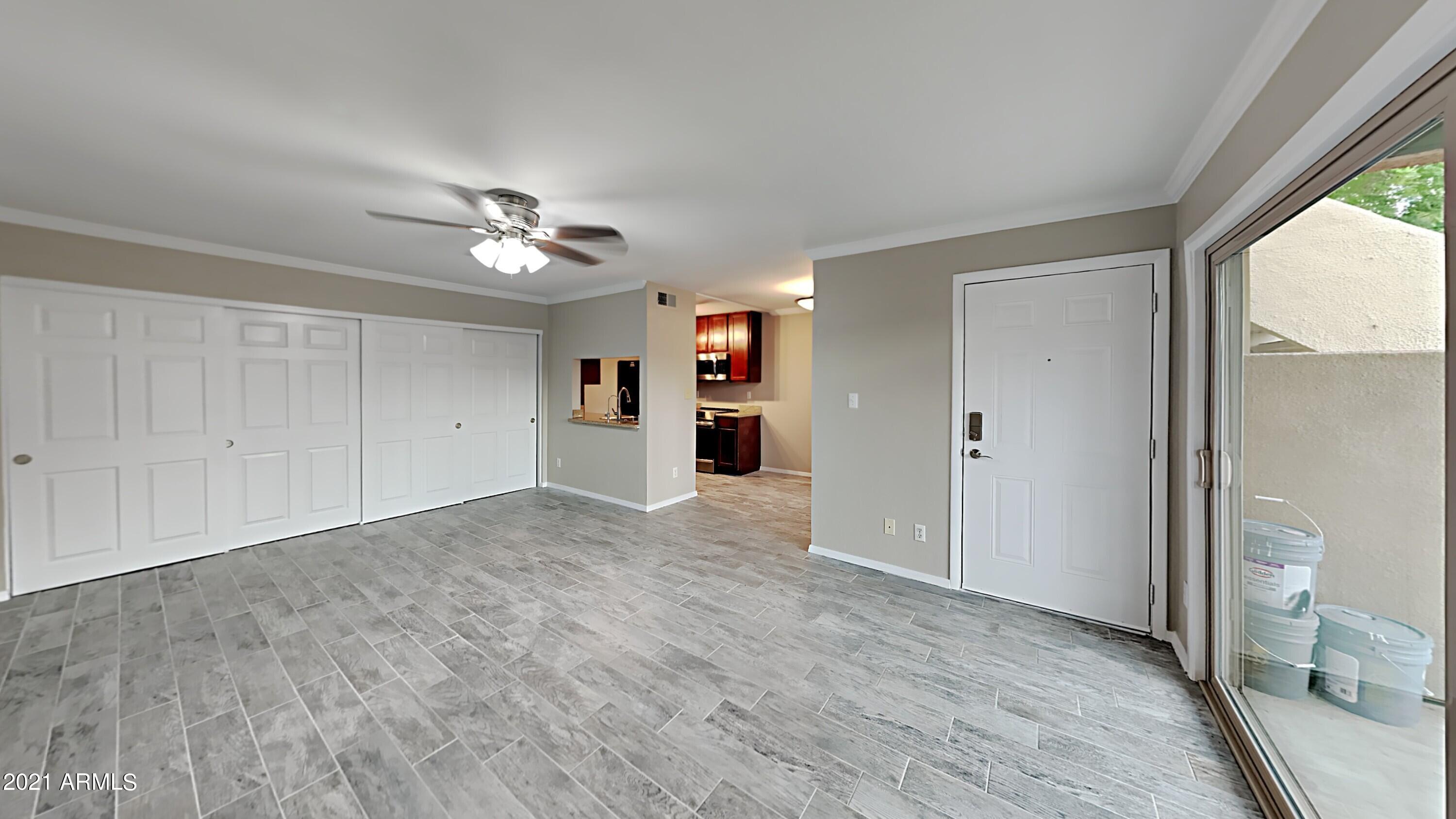 3500 North Hayden Road, Unit 1703 Scottsdale, AZ 85251 - Photo 2 of 8 a view of an empty room with a window
