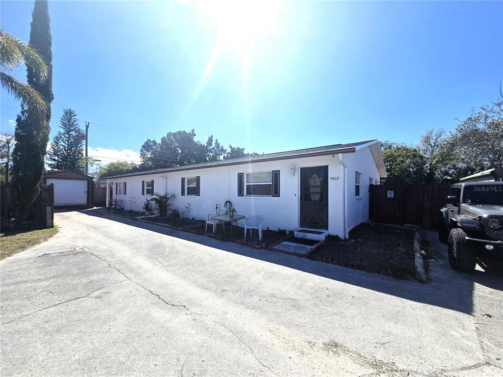 a view of a house with a patio