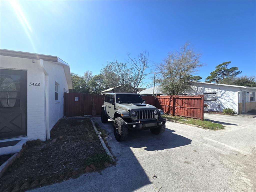 5422 Amy Lane New Port Richey, FL 34652 - Photo 4 of 25 a car parked in front of house