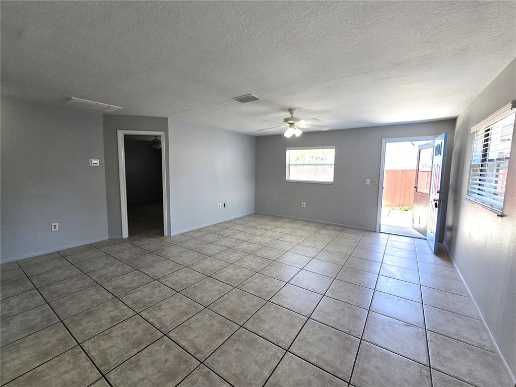 5422 Amy Lane New Port Richey, FL 34652 - Photo 8 of 25 a view of an empty room and window