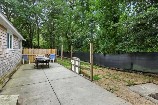 a view of backyard with furniture
