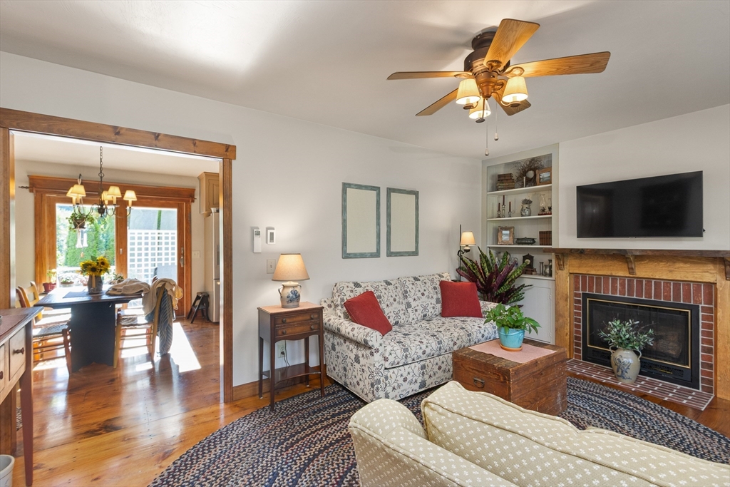 298 Torrey Road Southbridge, MA 01550 - Photo 13 of 40 a living room with furniture and a fireplace