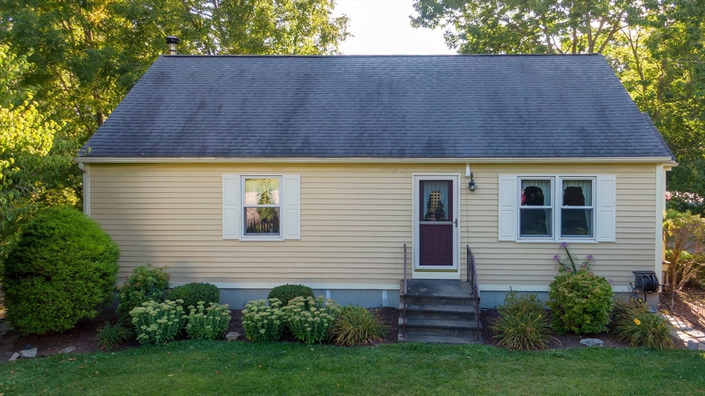 298 Torrey Road Southbridge, MA 01550 - Photo 2 of 40 a back view of a house with a yard