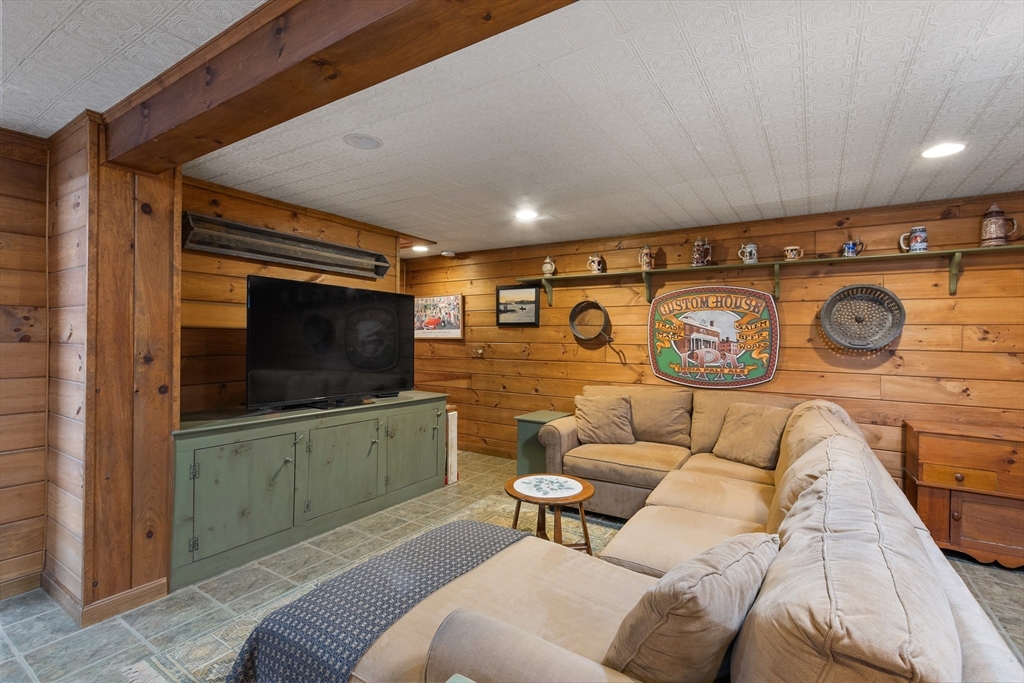 298 Torrey Road Southbridge, MA 01550 - Photo 24 of 40 a living room with furniture and a flat screen tv