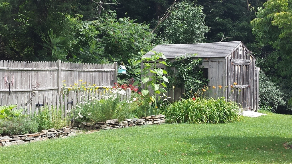 298 Torrey Road Southbridge, MA 01550 - Photo 33 of 40 a view of a backyard with plants