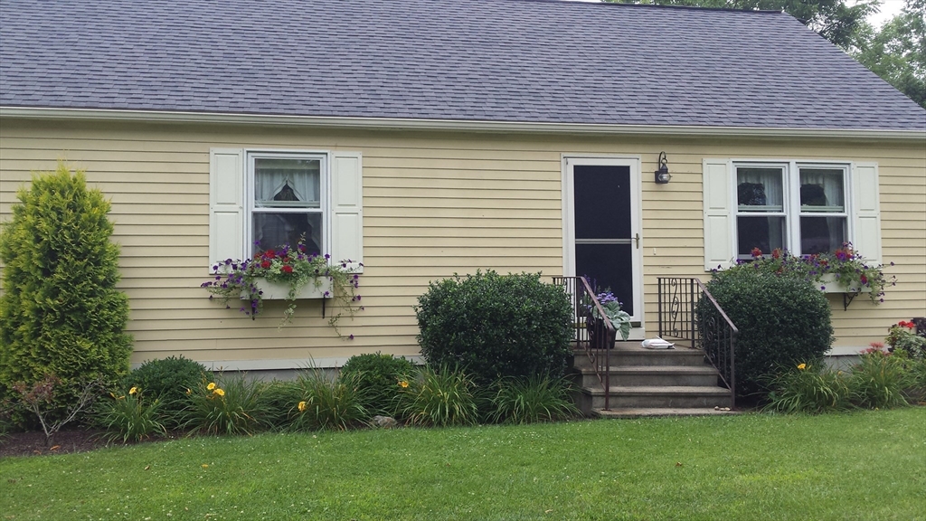 298 Torrey Road Southbridge, MA 01550 - Photo 36 of 40 a front view of a house with garden
