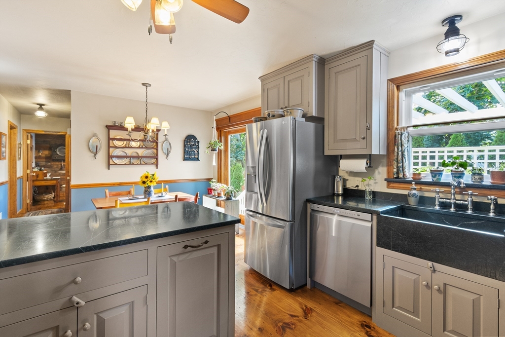 298 Torrey Road Southbridge, MA 01550 - Photo 7 of 40 a kitchen with refrigerator and window