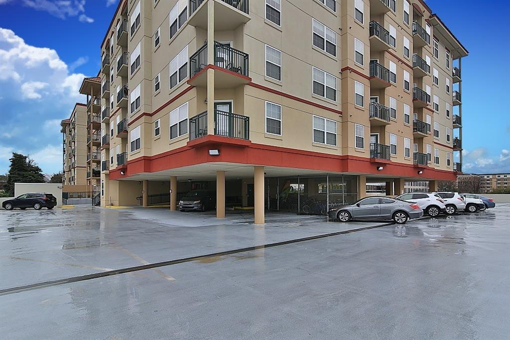 230 East Ponce De Leon Avenue, Unit 327 Decatur, GA 30030 - Photo 1 of 24 a view of a building with car parked