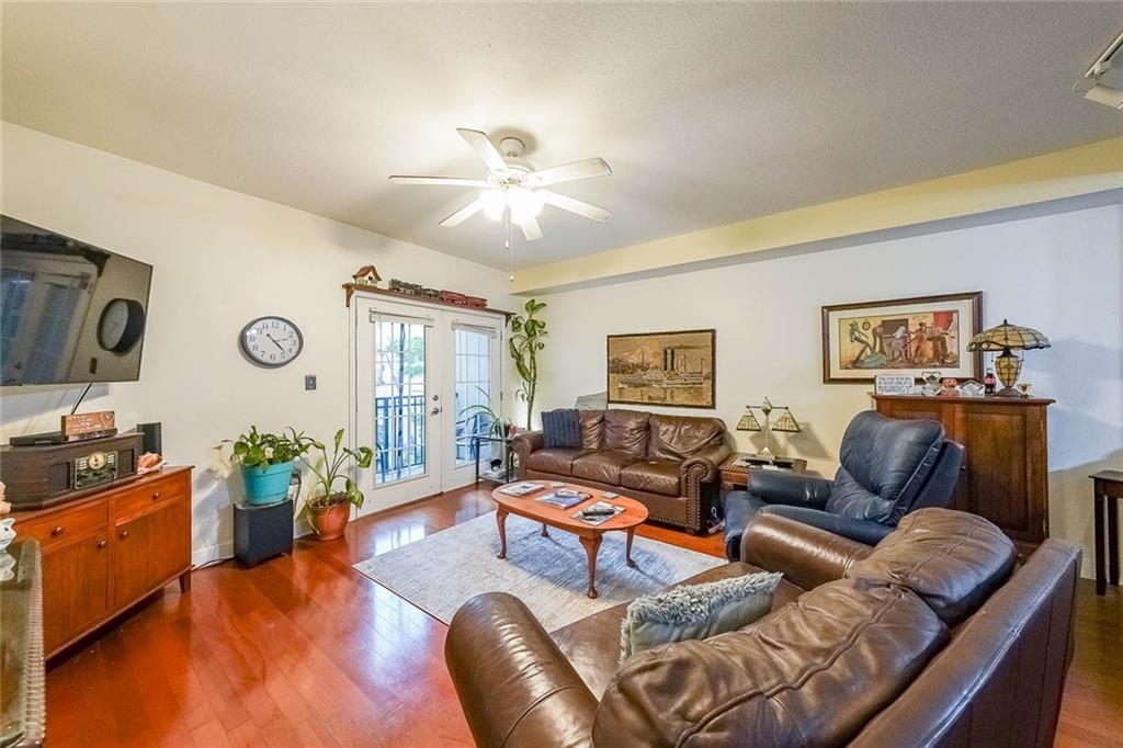 230 East Ponce De Leon Avenue, Unit 327 Decatur, GA 30030 - Photo 12 of 24 a living room with furniture