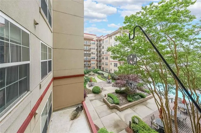 a balcony with view of trees