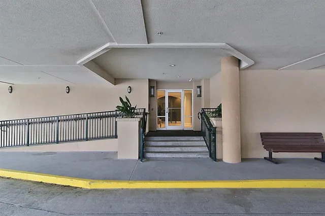 a view of swimming pool with seating area
