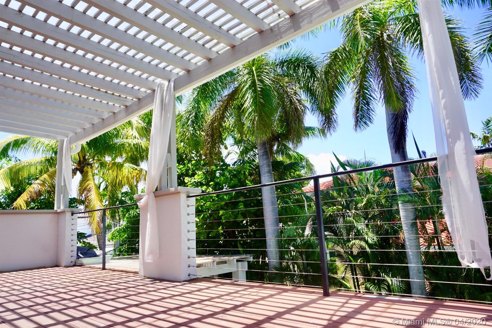 662 Woodcrest Road Key Biscayne, FL 33149 - Photo 17 of 48 Great spacious balcony off the Master Bedroom