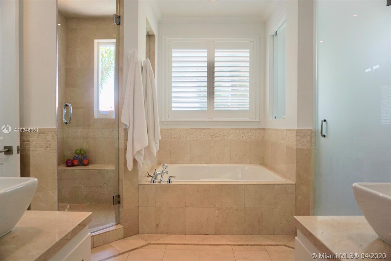 662 Woodcrest Road Key Biscayne, FL 33149 - Photo 18 of 48 Master Bathroom with private toilet area
