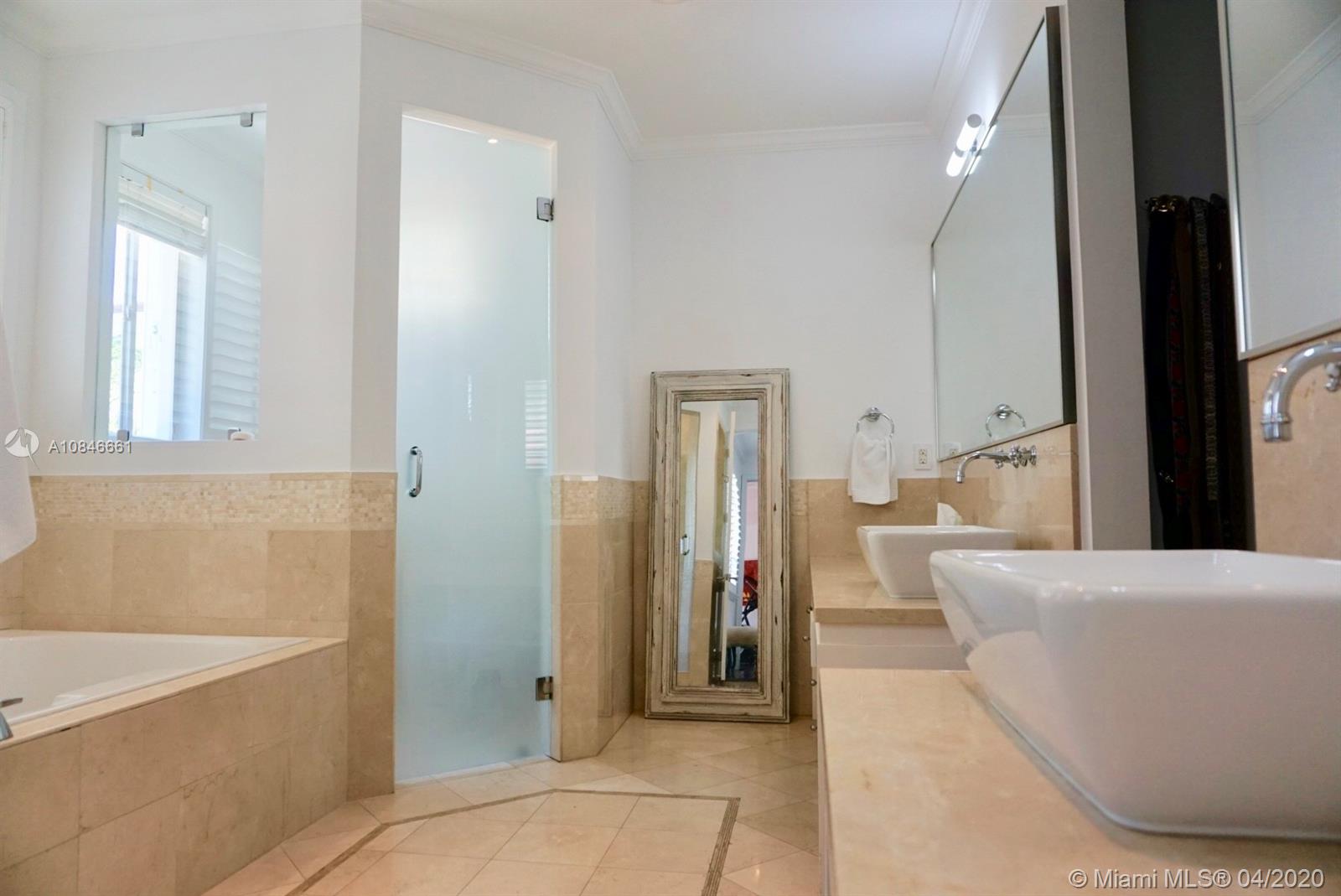 662 Woodcrest Road Key Biscayne, FL 33149 - Photo 19 of 48 Master Bedroom Dual sinks - vapor shower and jacuzzi
