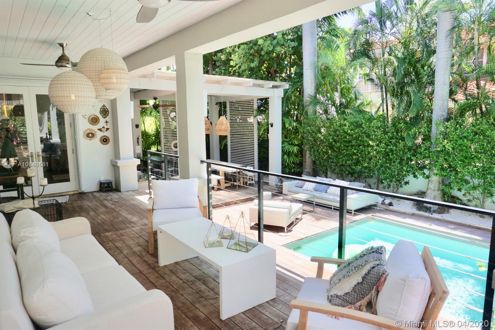 662 Woodcrest Road Key Biscayne, FL 33149 - Photo 31 of 48 Terrace overlooking sparkling pool