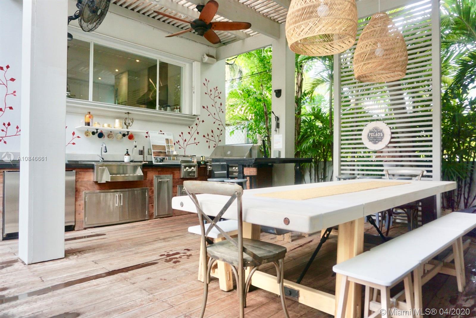 662 Woodcrest Road Key Biscayne, FL 33149 - Photo 32 of 48 Inviting roofed Summer Kitchen