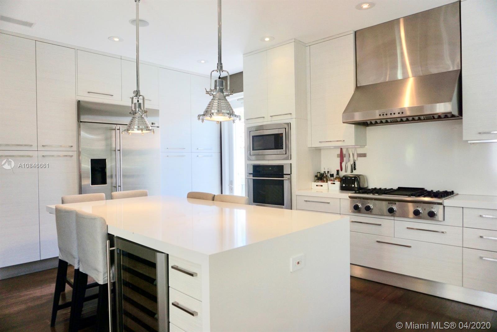 662 Woodcrest Road Key Biscayne, FL 33149 - Photo 10 of 48 En of the line appliances and gas stove