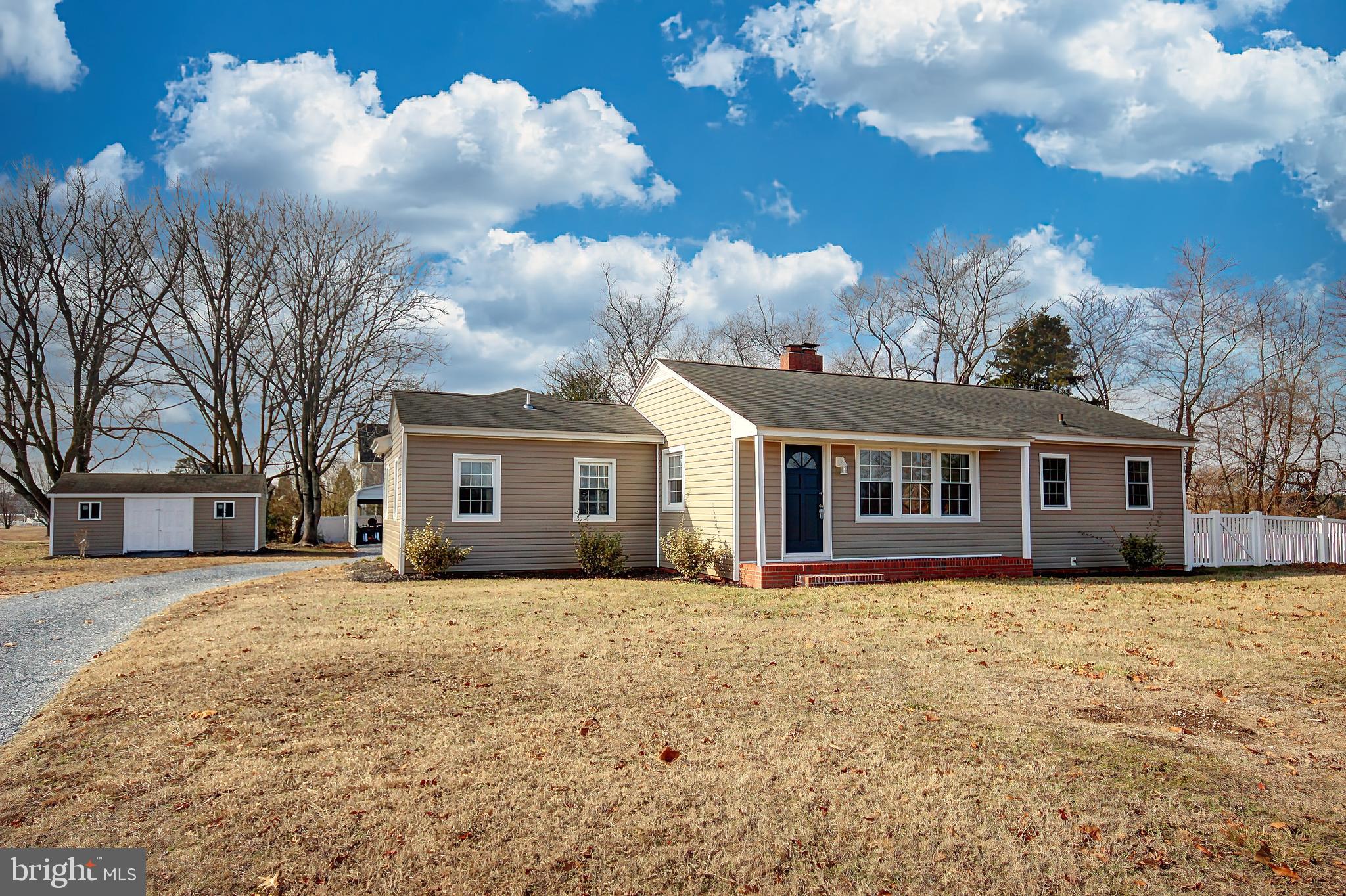 26177 Rewastico Road Hebron, MD 21830 - Photo 1 of 20 front view of a house with a yard