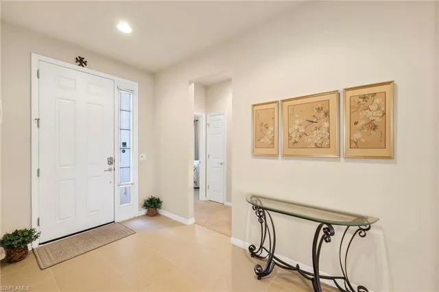 a view of a hallway with front door