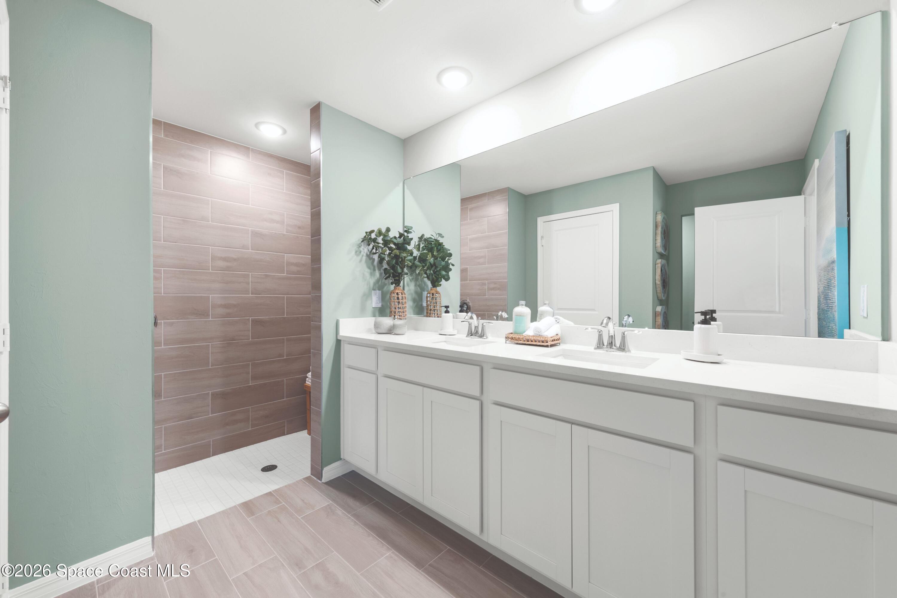 189 Finkle Street Palm Bay, FL 32908 - Photo 10 of 14 StAugustine_PrimaryBath_SPOT_CC_25SEP