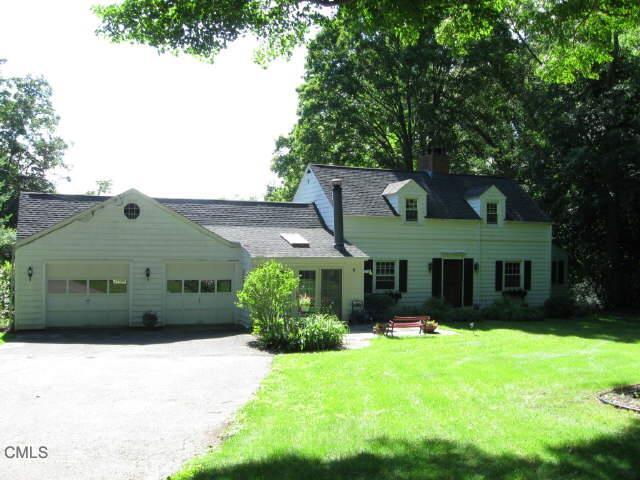 12 North Beech Tree Road Brookfield, CT 06804 - Photo 1 of 1 a front view of a house with a yard and garage