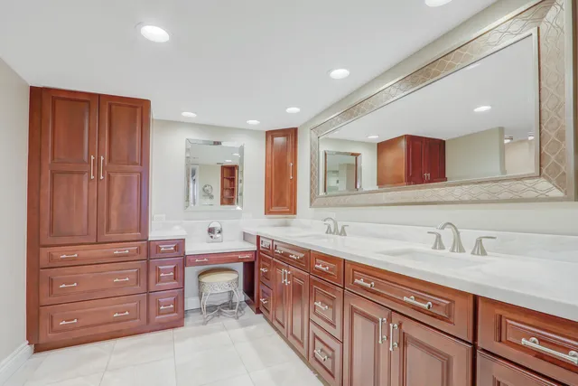 a bathroom with a shower toilet and sink