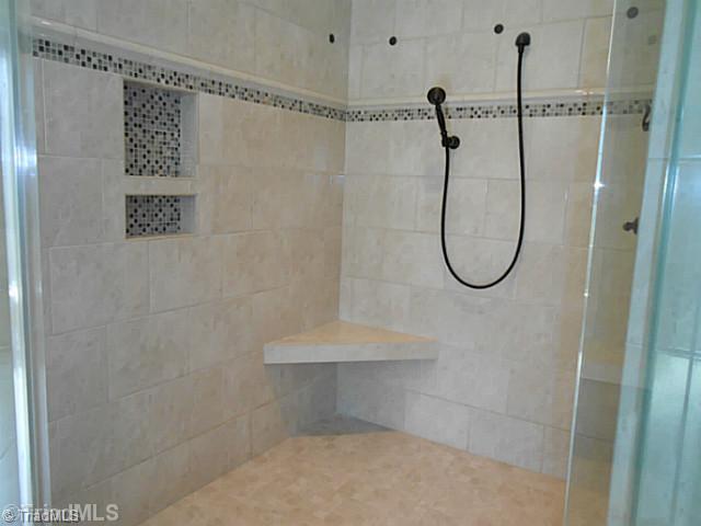 5808 Bison Drive Oak Ridge, NC 27310 - Photo 10 of 16 Master Bath/Spa. Large tile shower in master bath
