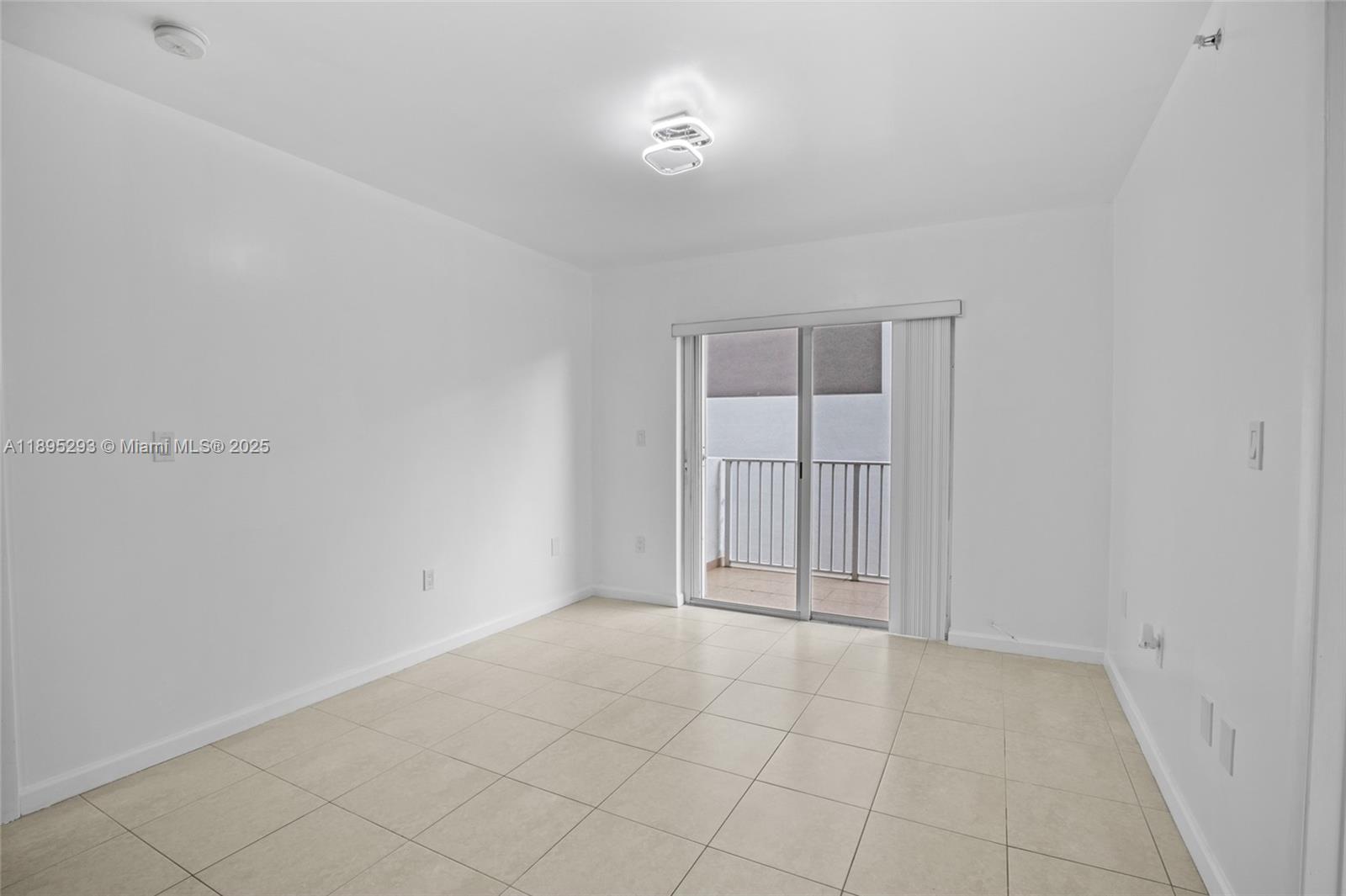 1060 Northwest 7th Street, Unit 106 Miami, FL 33136 - Photo 13 of 26 a view of an empty room and window