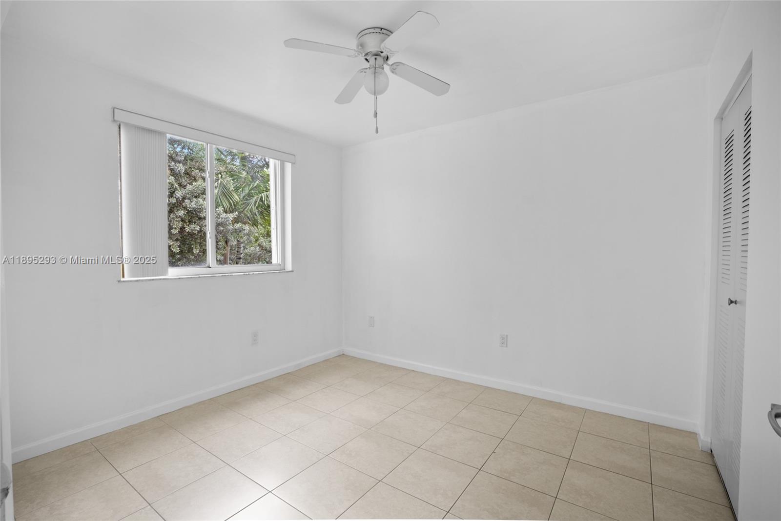 1060 Northwest 7th Street, Unit 106 Miami, FL 33136 - Photo 14 of 26 a view of a window in a room
