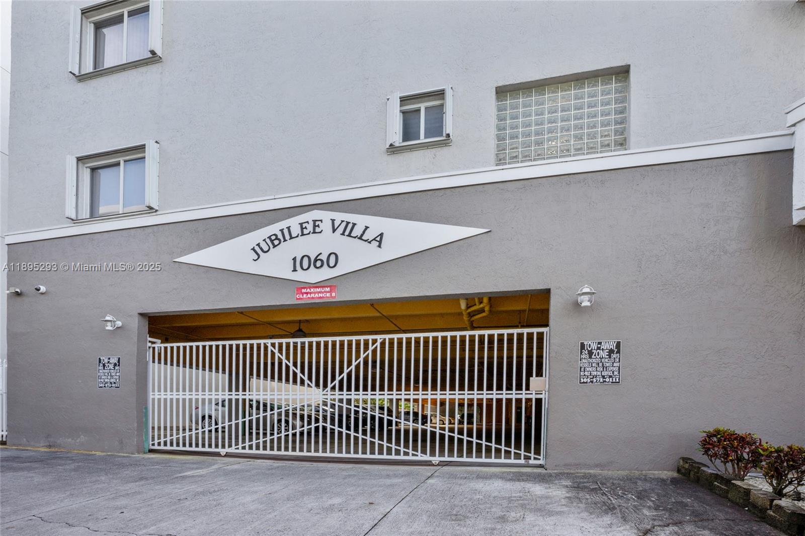 1060 Northwest 7th Street, Unit 106 Miami, FL 33136 - Photo 2 of 26 a view of a door and a window