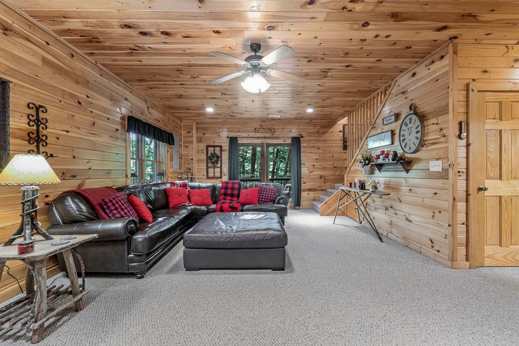 115 Lakota Trail Blue Ridge, GA 30513 - Photo 30 of 49 a living room with furniture and a ceiling fan