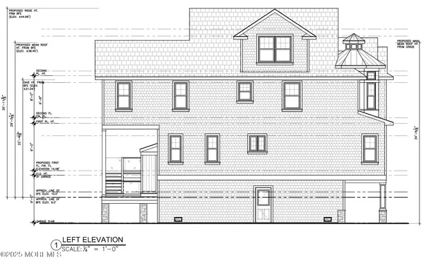 a black and white photo of a living room