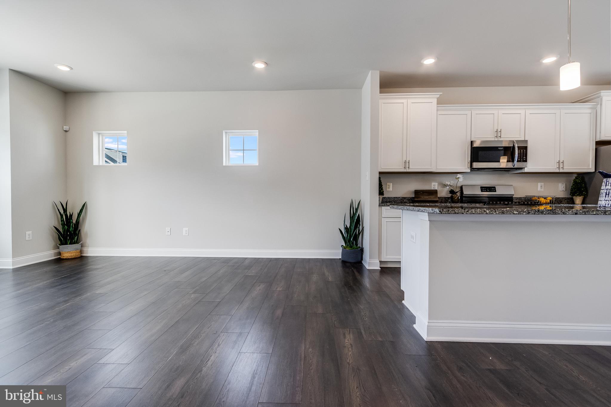 35148 Wright Way Millsboro, DE 19966 - Photo 6 of 35 Great room leading to kitchen