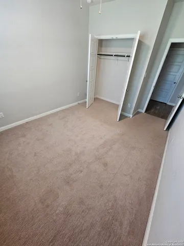 an empty room with a fireplace