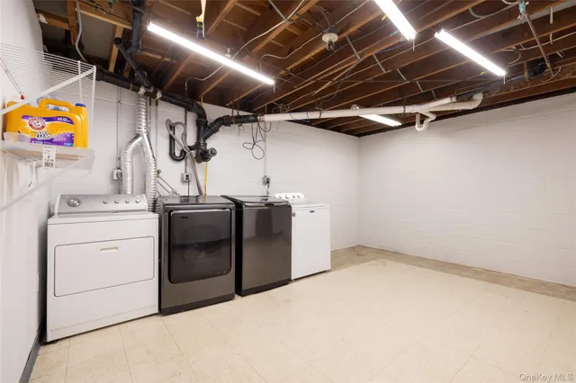 a utility room with dryer and washer