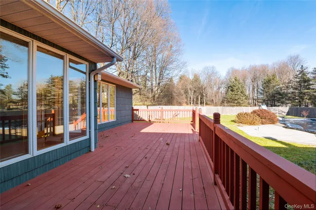 a view of balcony with wooden floor and outdoor space