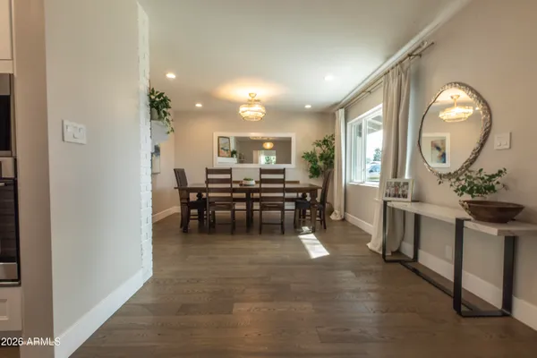 a view of a dining room with furniture