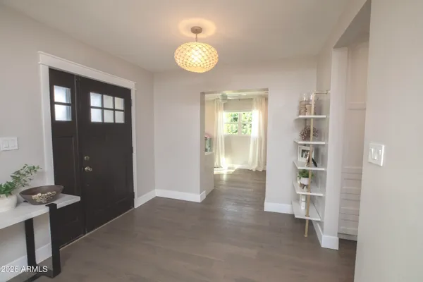 an empty room with shelves