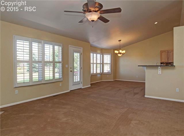 8756 Del Rio Road Peyton, CO 80831 - Photo 7 of 31 View of the Dining Room with bay window