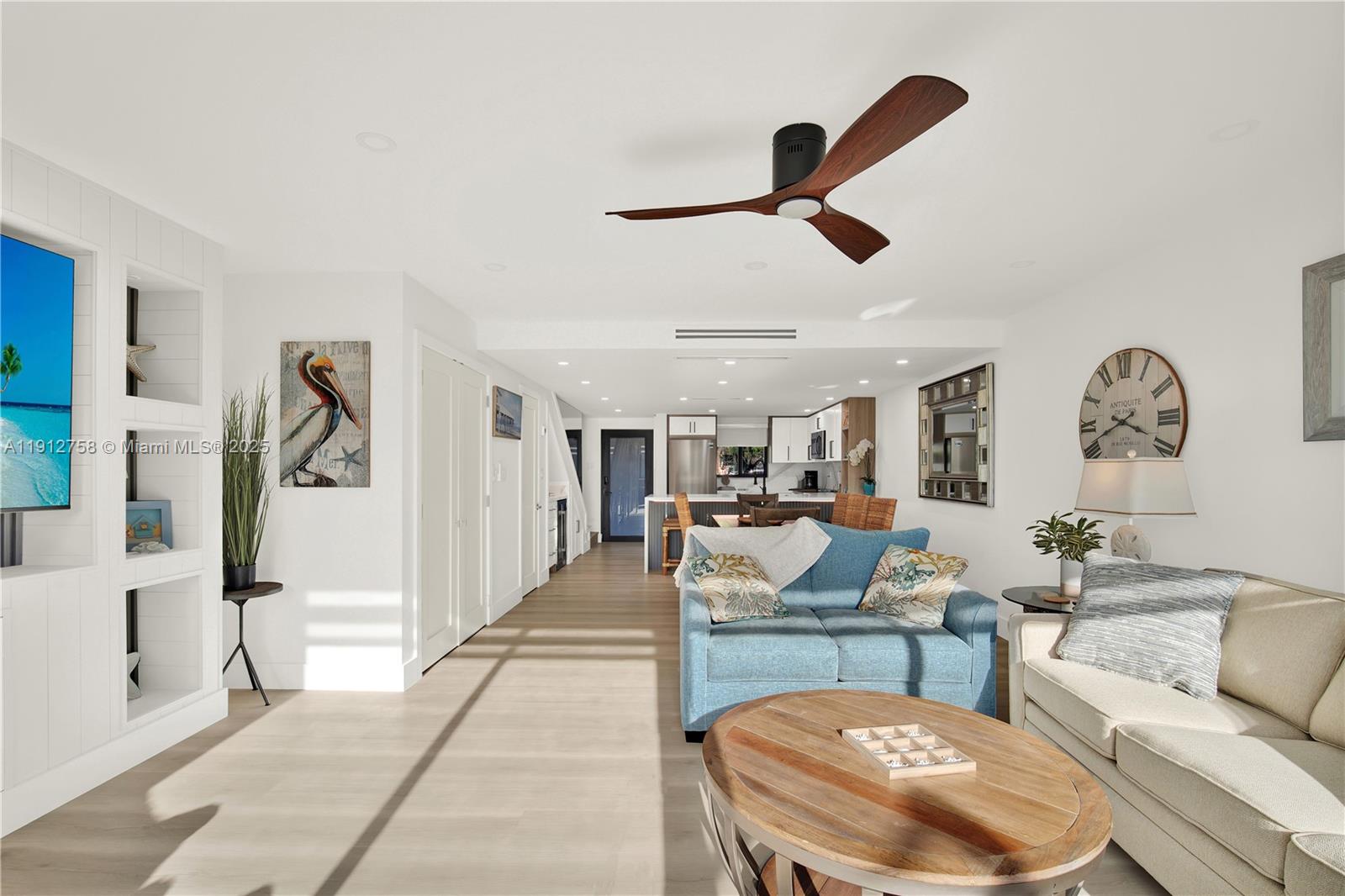 96000 Overseas Highway, Unit L5 Key Largo, FL 33037 - Photo 14 of 55 a living room with furniture and a window