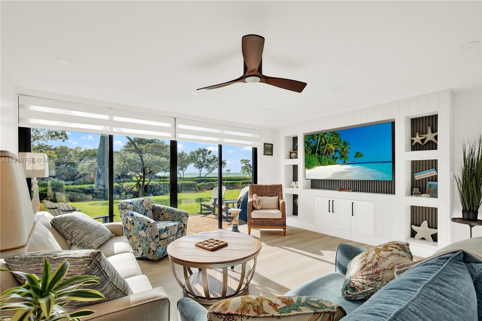 96000 Overseas Highway, Unit L5 Key Largo, FL 33037 - Photo 21 of 55 a living room with furniture and a large window