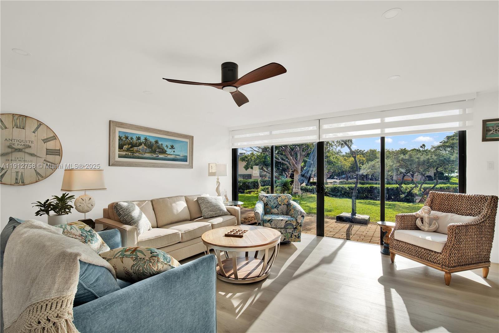 96000 Overseas Highway, Unit L5 Key Largo, FL 33037 - Photo 22 of 55 a living room with furniture and a large window