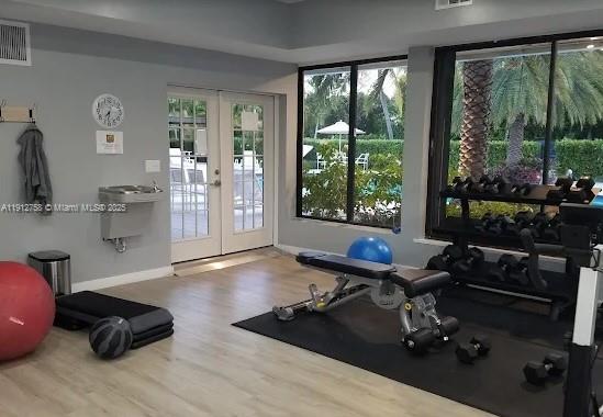 96000 Overseas Highway, Unit L5 Key Largo, FL 33037 - Photo 51 of 55 a living room with furniture and a floor to ceiling window