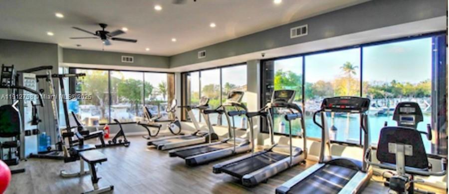 96000 Overseas Highway, Unit L5 Key Largo, FL 33037 - Photo 52 of 55 a view of a room with gym equipment and floor to ceiling window